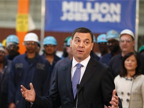 Ontario PC Leader Tim Hudak makes a campaign stop at Automatic Coating Ltd in Scarborough on Tuesday, May 6, 2014. Michael Peake/Toronto Sun/QMI Agency