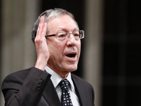 Liberal MP Irwin Cotler speaks during Question Period in the House of Commons on Parliament Hill in Ottawa December 15, 2011.       (REUTERS/Chris Wattie)