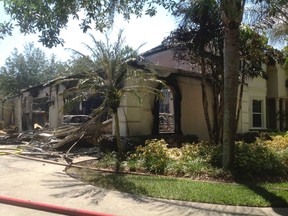 A house owned by former tennis pro James Blake is seen after a fire, in this handout photograph provided by Hillsborough Fire Rescue in Tampa, Florida May 7, 2014 (REUTERS/Hillsborough Fire Rescue/Handout via Reuters)