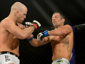 Aaron Gallicchio, shown here fighting Mark Marusz in April 2013, had to be separated from fellow fighter Marcus Edwards at a pre-fight appearance on Wednesday. (Gavin John, QMI Agency)