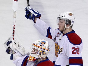 The Edmonton Oil Kings goalie Tristan Jarry and Mads Eller celebrate their win against the Portland Winterhawks  at Rexall Place, in Edmonton Alta., on Wednesday May 7, 2014. The Oil Kings won Game 4 of the WHL final series 2-0. David Bloom/Edmonton Sun/QMI Agency