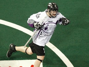 Edmonton defender Jarrett Toll (3) celebrates his goal on Vancouver goalie Tyler Richards (00) as the Edmonton Rush play the Vancouver Stealth at Crystal Glass Field during the second half of the game at Rexall Place in Edmonton, Alta., on Friday, April 25, 2014. The Rush held a Tribute to the Stollery Night on Friday where Captain Canada, and former Edmonton Oiler, Ryan Smyth attended and the team wore special jerseys. Ian Kucerak/Edmonton Sun/QMI Agency