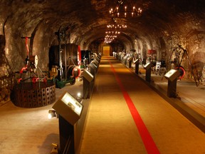 Tunnels with antique winemaking and bottling equipment are featured on the Mumm Champagne cellar tour. RICK STEVES PHOTO