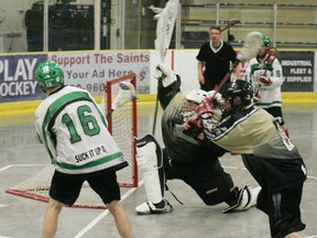 Despite the best efforts of a Slash defender, and their goaltender, the Okotoks player made good on this scoring chance on the power play.