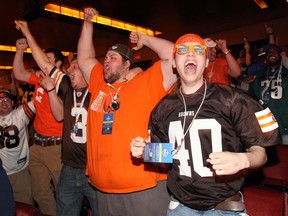 Cleveland Browns fans cheer after Johnny Manziel (Texas A&M) is selected as the number twenty-two overall pick in the first round of the 2014 NFL Draft to the Cleveland Browns at Radio City Music Hall on May 8, 2014 in New York, NY, USA (Brad Penner/USA TODAY Sports)