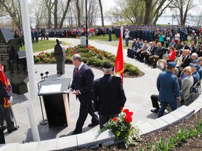 Hundreds of people - from members of the Canadian Forces posted at 8 Wing/CFB Trenton, family members, war veterans, civilians to local politicians - pay respect to the 158 soldiers who were killed while serving in Afghanistan during the National Day of Honour ceremony at the Afghanistan Memorial in Bain Park in Quinte West, Ont. Friday, May 9, 2014. - JEROME LESSARD/THE INTELLIGENCER/QMI AGENCY