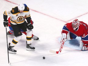 Montreal Canadiens goalie Carey Price makes a save against Boston Bruins right winger Matt Fraser during the third period in Game 4 at the Bell Centre. (Jean-Yves Ahern/USA TODAY Sports)