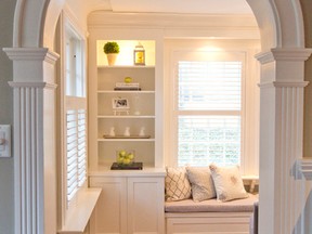 A built-in bench seat and bookshelves are features in a sunroom in Heather Matthias' Wortley Road home in London. (CRAIG GLOVER, The London Free Press)