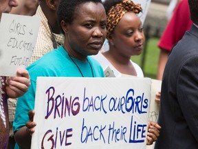Women hold signs during a vigil held in the wake of the kidnapping of more than 200 Nigerian schoolgirls by the Islamist militant group Boko Haram, in Washington May 9, 2014. U.S. lawmakers have been calling on the Obama administration - and Nigeria's government - to do more to retrieve the girls taken by Boko Haram militants from their school in the northern Nigerian village of Chibok on April 14. 

REUTERS/Joshua Roberts