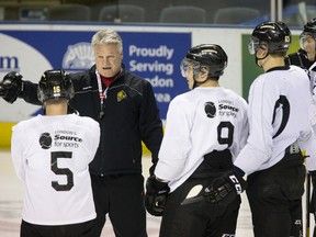 London Knights head coach Dale Hunter instructs players during team practice at Budweiser Gardens in London, Ont. on Tuesday May 6, 2014. (DEREK RUTTAN, The London Free Press)