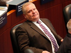 Councillor Doug Ford at the meeting of Toronto city council, the first with his brother Mayor Rob Ford in rehab, on Tuesday, May 6, 2014. (Michael Peake/Toronto Sun)