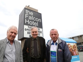 Falcon Hotel owners Bob Lamoureux, left, and Bob Lalonde, along with hotel general manager Norm Dupuis, right, stand outside the hotel in Garson on Friday. The hotel is closing for good this weekend. JOHN LAPPA/THE SUDBURY STAR/QMI AGENCY