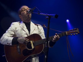 Frontman Dallas Green of City and Colour plays their third song of the night The Grand Optimist at the Air Canada Centre in Toronto on Friday May 9, 2014. (Jack Boland/Toronto Sun/QMI Agency)