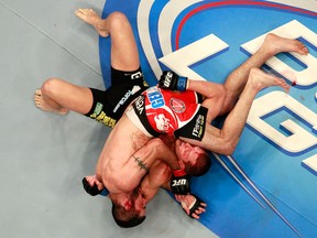 Matt Brown (top) grapples with Stephen Thompson during their welterweight bout at UFC 145 in Atlanta on April 21, 2012. (Kevin C. Cox/Getty Images/AFP/Files)