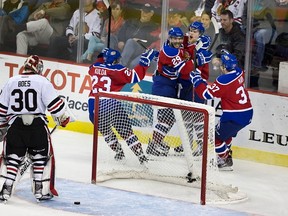 The Edmonton Oil Kings celebrate one of their two second period goals on Friday. RANDY L. RASMUSSEN/The Oregonian