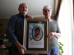 Claudette and Guy Roberge hold a photograph of their son Gaetan at their home in Sudbury. Warrant Officer Gaetan Roberge, was 45 when he was killed while on patrol in the Panjwaii district in the western part of Kandahar province early the afternoon of Dec. 27, 2008.  GINO DONATO/THE SUDBURY STAR/QMI AGENCY