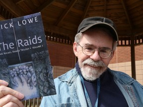 Gino Donato/The Sudbury Star
Author Mick Lowe with his new book, The Raids.