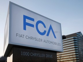 A new Fiat Chrysler Automobiles sign is pictured after being unveiled at Chrysler Group World Headquarters in Auburn Hills, Mich., on May 6, 2014. (REUTERS/Rebecca Cook)