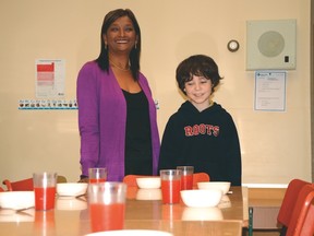 Savi Houldin makes sure Canyon students are fed and happy before school. John Stoesser photo/QMI Agency.