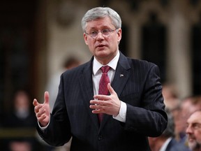 Prime Minister Stephen Harper speaks during Question Period in the House of Commons on Parliament Hill in Ottawa May 6, 2014. (REUTERS/Chris Wattie)