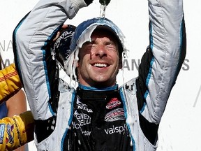 Simon Pagenaud of France celebrates winning the Grand Prix of Indianapolis at Indianapolis Motor Speedway on Saturday. (GETTY IMAGES)