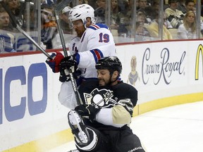 New York Rangers centre Brad Richards battles for position with Pittsburgh Penguins right wing Craig Adams during Game 5 on Friday night. (Charles LeClaire/USA TODAY Sports)