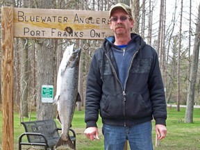 Camlachie's Bill Gray, pictured above with his 15.92 lb winning salmon, captured the title at the 38th Annual Bluewater Angler's Salmon Derby. SUBMITTED PHOTO