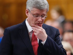 Prime Minister Stephen Harper speaks during Question Period in the House of Commons on Parliament Hill in Ottawa on April 30, 2014. (REUTERS/Chris Wattie)