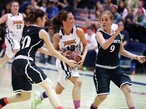 Sudbury Jam's Andrea Zulich splits a pair of Timmins Selects defenders during third quarter action of the Ontario Basketball Association's U17 Ontario Cup gold medal final at Ben Avery Gymnasium on Sunday afternoon.