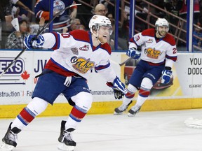 Edmonton Oil Kings Henrik Samuelsson (10) and Mitch Moroz (29) celebrate Samuelsson's second goal against the Winterhawks during the first period of Game 6 of the WHL championships at Rexall Place in Edmonton, Alta., on Sunday, May 11, 2014. Ian Kucerak/Edmonton Sun/QMI Agency