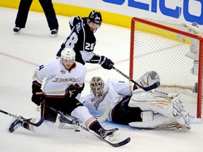 Anaheim Ducks goalie John Gibson makes a save against Los Angeles Kings centre Jarret Stoll on Saturday night. (Kirby Lee/USA TODAY Sports)