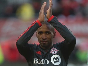 TFC striker Jermain Defoe applauds the fans after 1-0 win against DC United in Toronto March 22, 2014, at BMO Field. (Jack Boland/Toronto Sun)