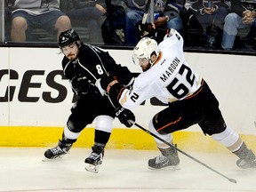 Los Angeles Kings defenceman Drew Doughty (left) and Anaheim Ducks left wing Patrick Maroon battle for the puck during Game 2 of their Western Conference series. (Kirby Lee/USA TODAY Sports)