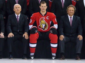 This could be the last time Jason Spezza is pictured with, from left, Senators president Cyril Leeder, general manager Bryan Murray, owner Eugene Melnyk, and head coach Paul MacLean. (Errol McGihon/Ottawa Sun)