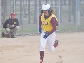 Kailee Fraser of the PCI Saints runs home during a game against W.C. Miller May 12. (Kevin Hirschfield/THE GRAPHIC/QMI AGENCY)