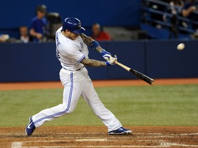 Toronto Blue Jays third baseman Brett Lawrie connects for a home run in the sixth inning against Los Angeles Angels at Rogers Centre on May 12, 2014 in Toronto, Ontario, CAN. (Dan Hamilton/USA TODAY Sports)