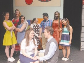 Eda Baja as Tracy Turnblad, and Justin Matthews as Link Larkin, star in the John Paul II secondary school production of the hit musical, Hairspray, opening Tuesday and continuing through Friday. Kim Khong/Special to QMI Agency