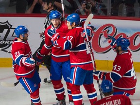 Canadiens forward Lars Eller (81) celebrates his first period goal against the Bruins with teammates Brian Gionta (21), Rene Bourque (17), Mike Weaver (43) and Nathan Beaulieu (40) during Game 6 of their playoff series in Montreal on Monday, May 12, 2014. (Ben Pelosse/QMI Agency)