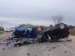 Two people are dead and a third badly hurt after this head-on crash on Hwy. 148 near Luskville, Que., on Tuesday morning, May 13, 2014. (MRC des Collines police image)
