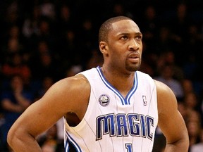 Former NBAer Gilbert Arenas of the Orlando Magic looks at the scoreboard during a game against the Detroit Pistons at Amway Arena on January 24, 2011 in Orlando, Florida. (Sam Greenwood/Getty Images/AFP)