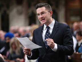 Minister of State for Democratic Reform Pierre Poilievre speaks during Question Period in the House of Commons on Parliament Hill in Ottawa April 7, 2014. REUTERS/Chris Wattie