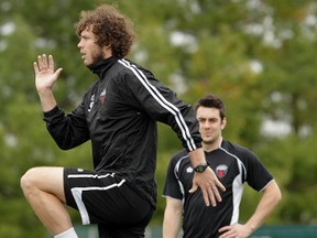 Ottawa Fury player Tommy Heinemann works out during practice in Ottawa Tuesday. Heinemann is trying to return to the team after an injury.  Tony Caldwell/Ottawa Sun