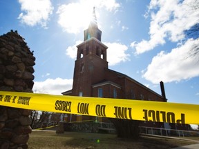 Police tape blocks off the scene of a shooting of a priest in St. Paul, Alberta. (REUTERS)