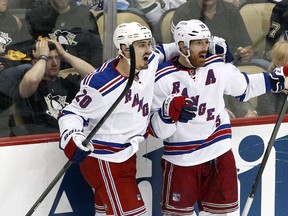 New York Rangers left wing Chris Kreider (20) and centre Brad Richards (19) react to a goal by Richards against the Pittsburgh Penguins during the second period in game seven of the second round of the 2014 Stanley Cup Playoffs at the CONSOL Energy Center. (Charles LeClaire-USA TODAY Sports)
