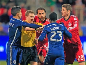 Things got a little feisty in the first leg between TFC and Vancouver after the Whitecaps’ Kekuta Manneh scored a late goal. (USA TODAY SPORTS)