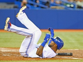 Toronto’s Jose Reyes hits the deck after an inside pitch on Tuesday night against Cleveland. Reyes is one of several Jays to go on the DL this season. (DAVE ABEL/Toronto Sun)