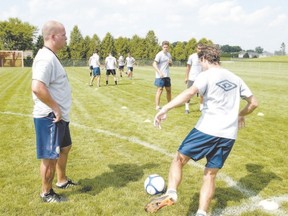 FC London coach Martin Painter, left, says the team has a five-year track record of success to live up to. (File photo)