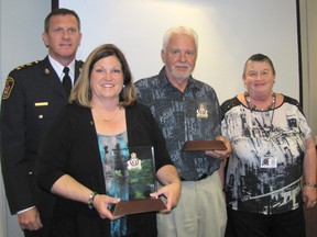 Penny Wilton and Gary Warwick each received a citation from the Chatham-Kent Police Services Board on May 13 for their involvement with the Blenheim Youth Centre. With them are Chief Dennis Poole and board chair Pat Belanger.