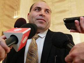 Mohamed Harkat talks to the media at the Supreme Court of Canada in this Oct. 10, 2013 file photo. (Tony Caldwell/QMI Agency)