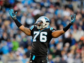 Carolina Panthers defensive end Greg Hardy was arrested on suspicion of domestic violence and communicating threats charges Tuesday. (